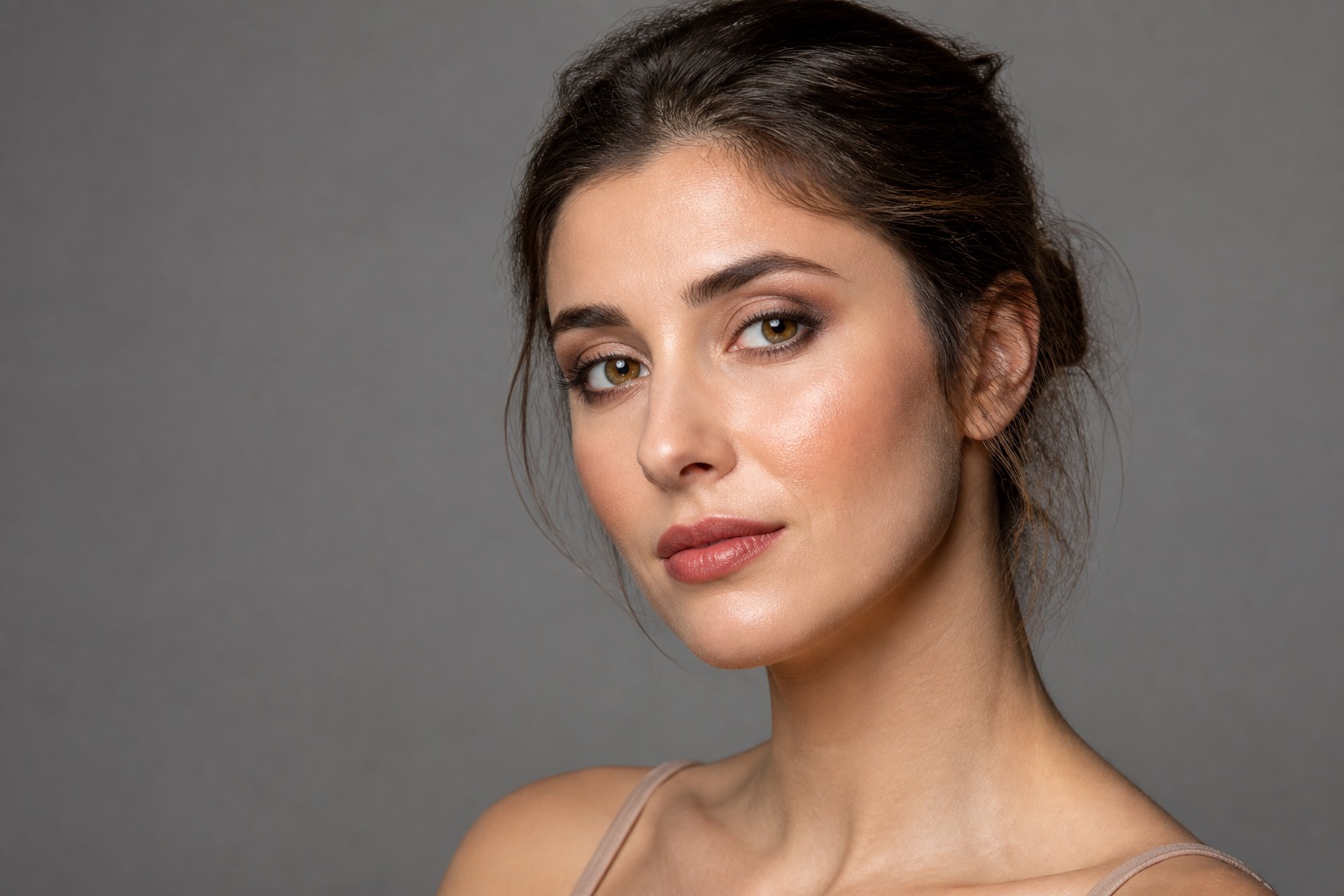 Professional beauty portrait retains natural skin texture and balanced makeup colour